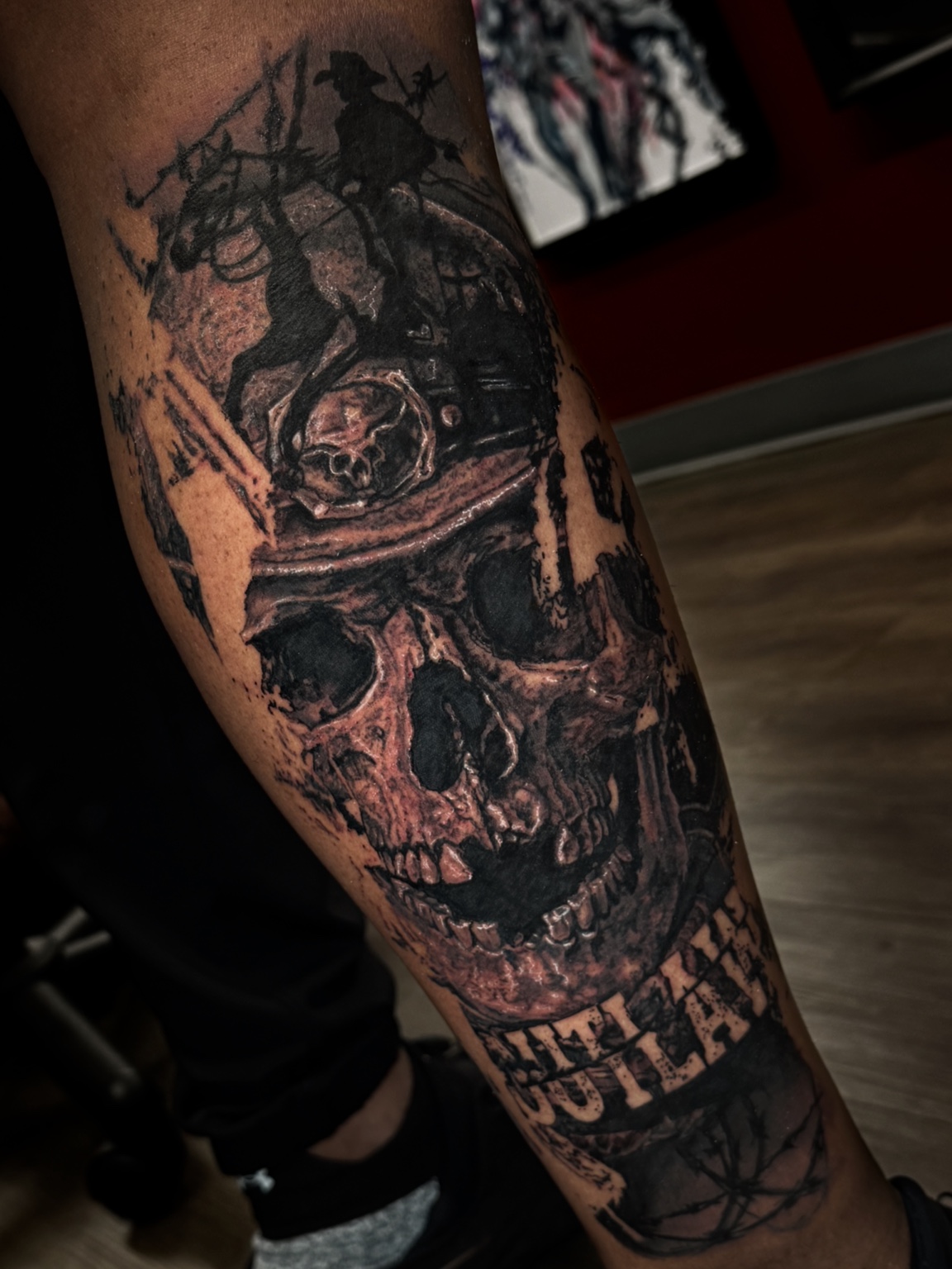 Black and grey skull and forest tattoo by Maverick Mayes