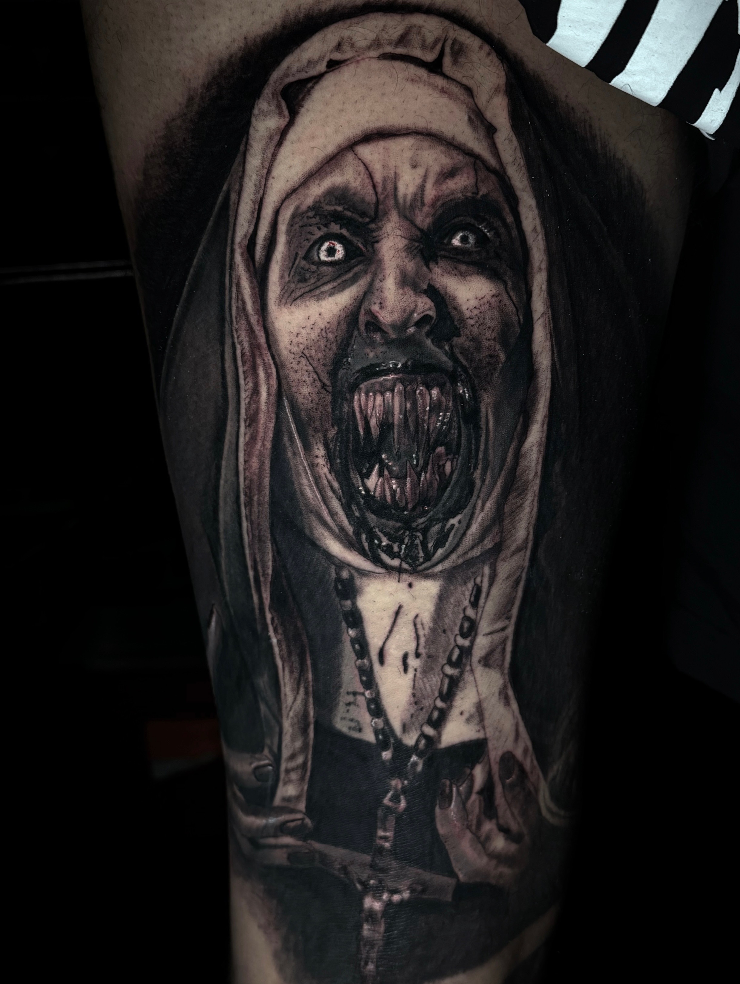 Black and grey horror portrait tattoo by Maverick Mayes